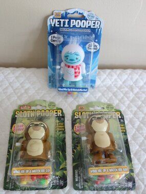 NIP New TREAT STREET Yeti Pooper (1), Sloth Pooper (2) Wind Up Walking Candy Dis